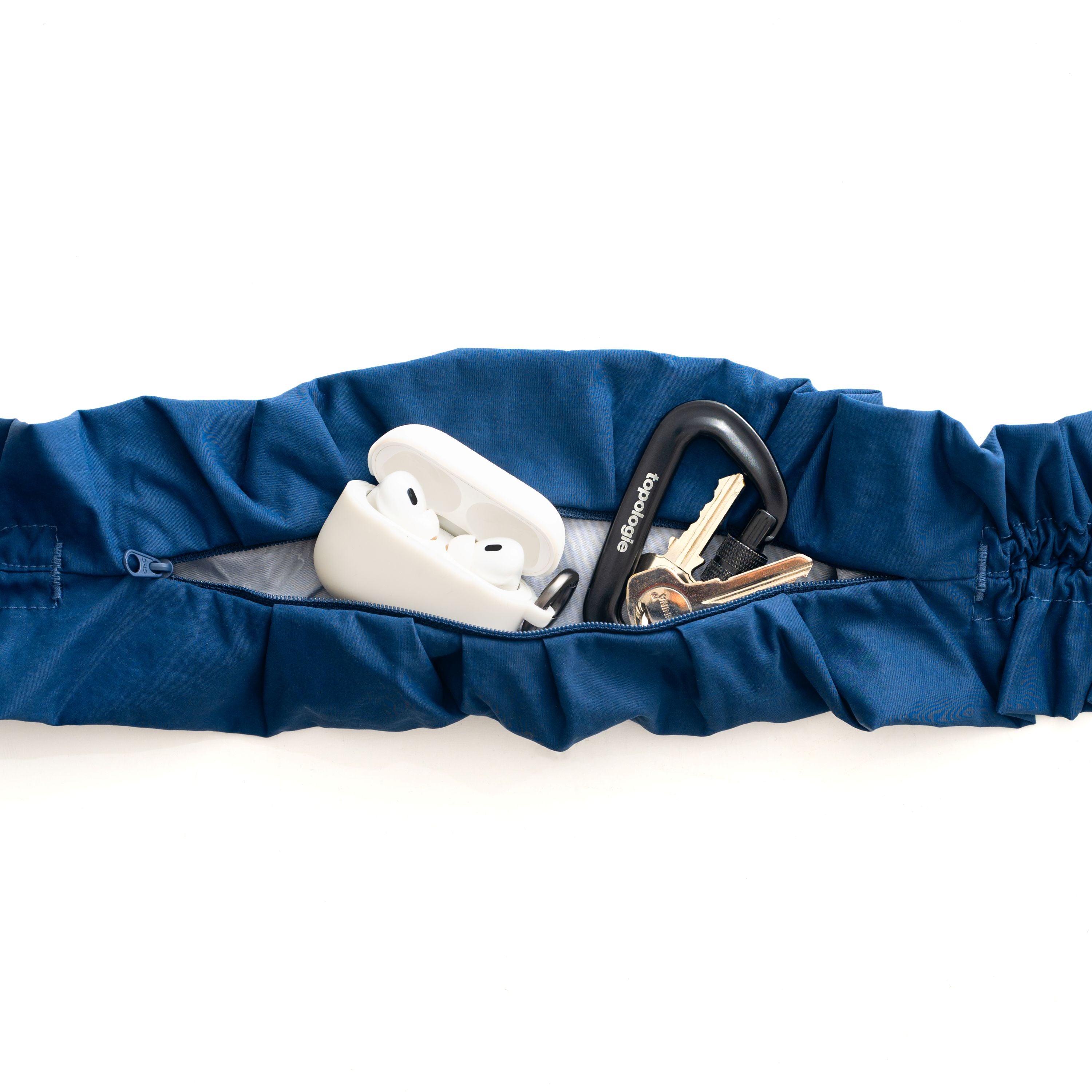 Scrunchie Pocket Sling – Topologie INTL
